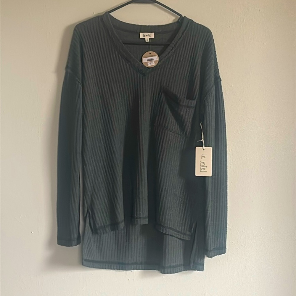 Size small, brand new, long sleeve shirt . Smoke free home.